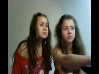 Open minded twin sisters didn't mind engaging in incest for their cam viewers as they kiss here
